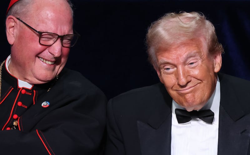 Cardinal Timothy Dolan, left, and Donald Trump share a laugh on Thursday night.