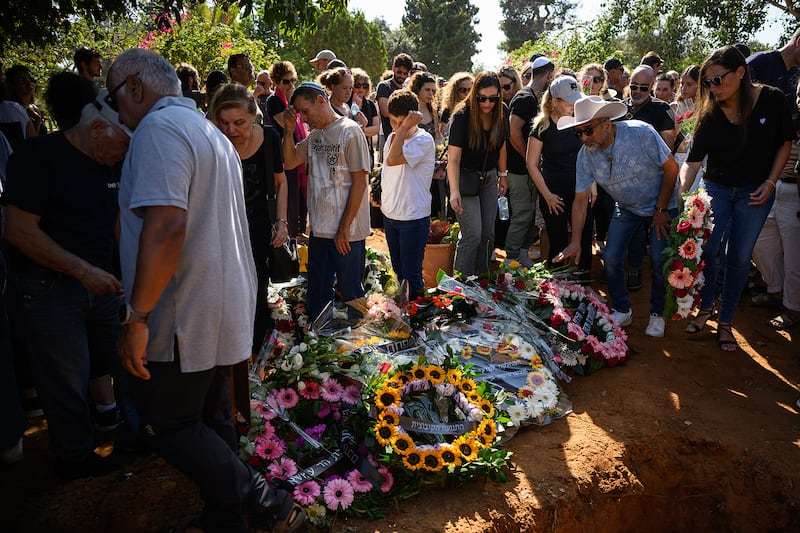 Friends and family attend the funeral of Mira Stahl.