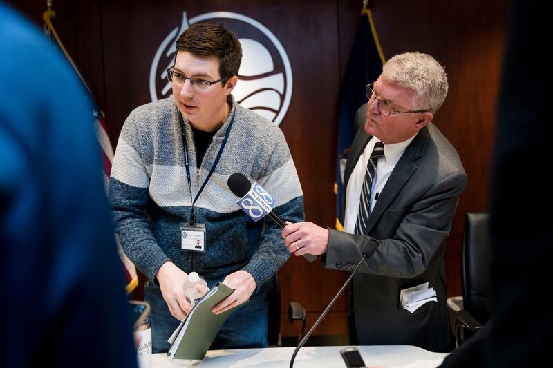 Ottawa County Commissioner Joe Moss speaks with reporters