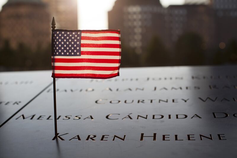 articles/2012/09/10/those-who-lost-loved-ones-on-9-11-cannot-forget-and-neither-should-america/911-memorial-daly_ykb9me