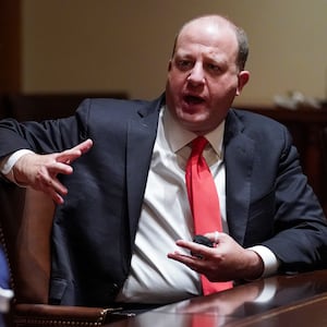 U.S. President Donald Trump listens to Colorado Governor Jared Polis during a meeting on the coronavirus disease (COVID-19) outbreak response.