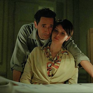 A photo still of Adrien Brody and Felicity Jones