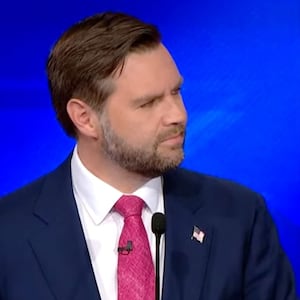 JD Vance, left, and Tim Walz during the CBS News debate.