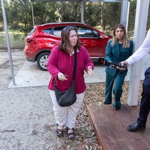 Erin Patterson arrives at her home in Leongatha, Victoria. Three people died after eating suspected Death Cap mushrooms used in a meal she had cooked.