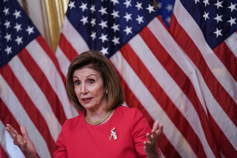 Nancy Pelosi gestures during a bill signing ceremony in Washington DC.