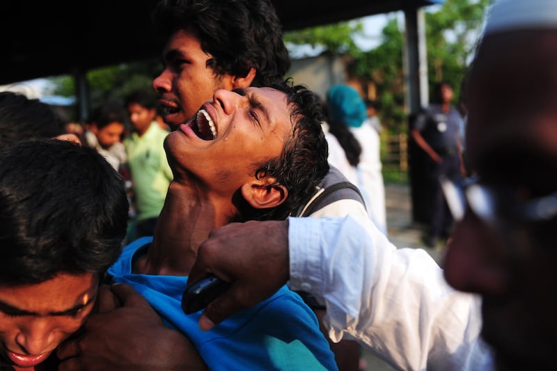 galleries/2013/04/24/tragic-aftermath-of-building-collapse-in-bangladesh/130424-bangladesh9_csccxq