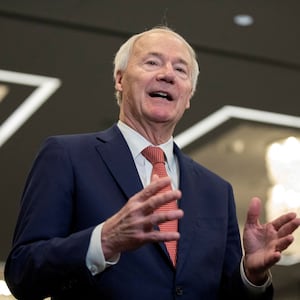 Asa Hutchinson speaks to media following the Republican Party of Iowa legislative breakfast in January 2024.