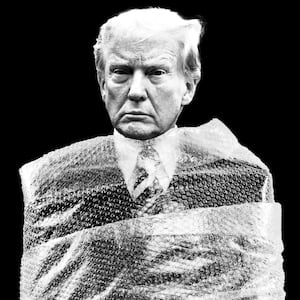 Photo illustration of Donald Trump wrapped in bubble wrap on a black background