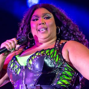 A picture of Lizzo, who has been accused by three of her former dancers of fostering a hostile work environment—as well as allegedly sexually harassing and fat shaming them—in a lawsuit filed Tuesday. More people have since come forward with allegations.