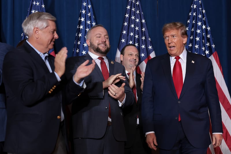 Sen. Lindsey Graham (L) says people get to their feet and clap at Mar-a-Lago whenever Donald Trump walks in.