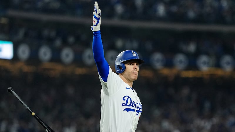 Freddie Freeman #5 of the Los Angeles Dodgers reacts after hitting a walk-off grand slam in the tenth inning of Game 1 of the 2024 World Series