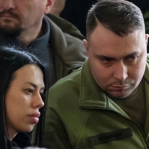 Ukraine’s Military Intelligence chief, Kyrylo Budanov, and his wife, Marianna, attend a memorial ceremony for Ukrainian interior minister, his deputy and officials on Jan. 21, 2023.