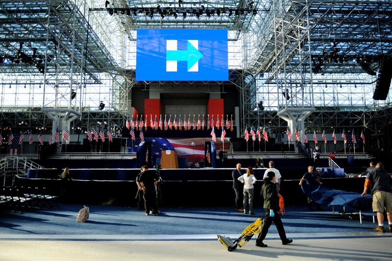 A large stage with a Hillary Clinton 2016 logo