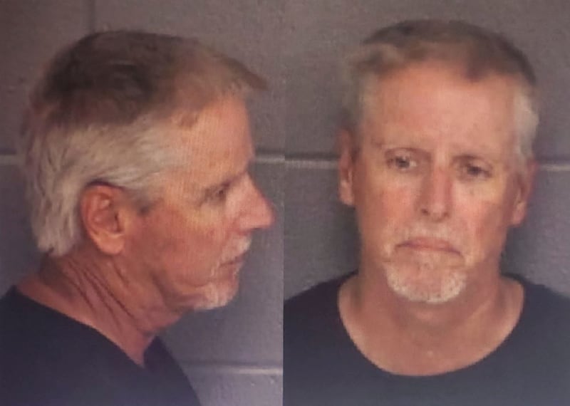 Colin Gray, 54, father of 14-year-old suspected Apalachee High School shooter Colt Gray, poses for police booking photos.   