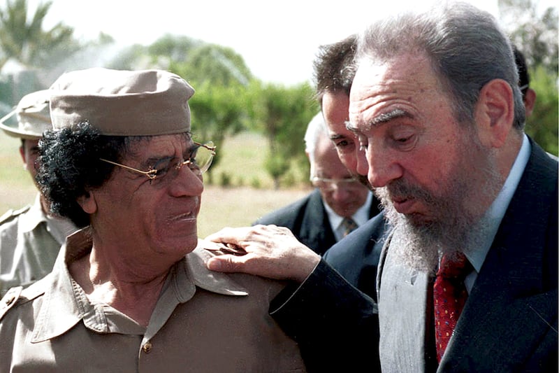 galleries/2012/01/10/hugo-chavez-with-his-bff-mahmoud-ahmadinejad-plus-the-tyrannical-friendships-of-castro-saddam-hussein-and-others-photos/dictator-bromance-castro-gaddafi_gdgdfm