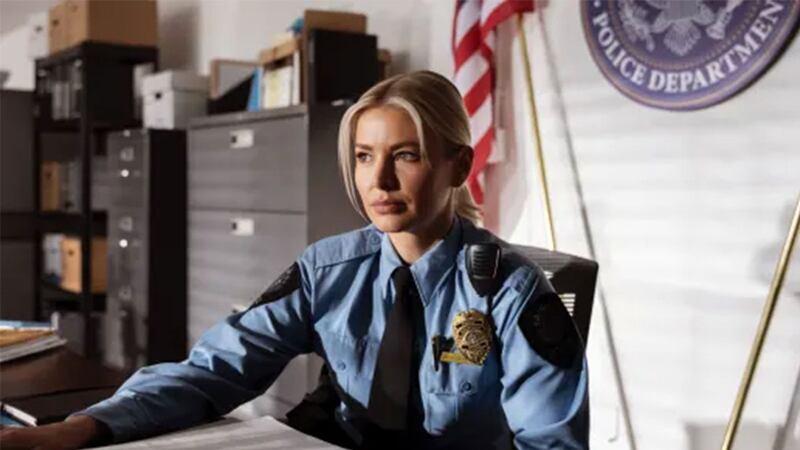 Ariana Maddix sitting at a desk in a still from ‘Buying My Daughter Back’