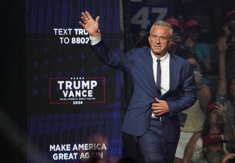 Former independent presidential candidate Robert F. Kennedy Jr. gestures during Republican presidential nominee and former U.S. President Donald Trump's rally in Glendale, Arizona, U.S., August 23, 2024.