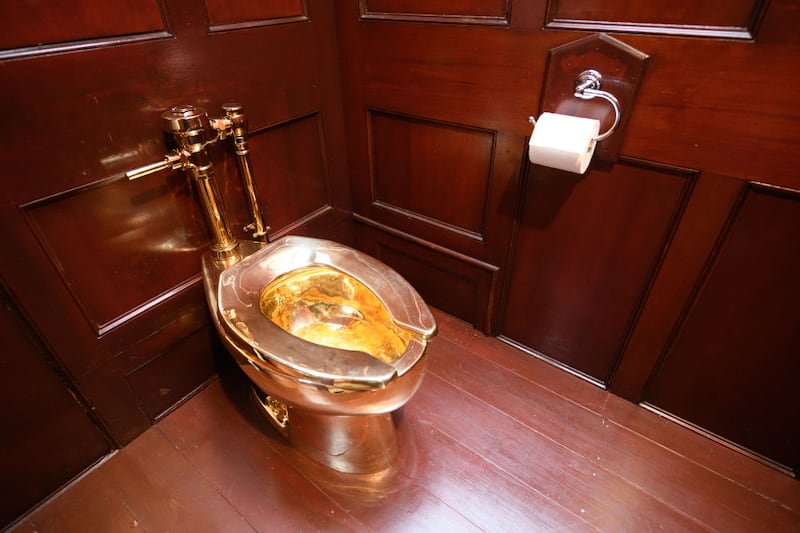 The toilet on display in the palace before it was stolen.