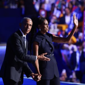 Barack and Michelle Obama join forces to attack Donald Trump at the DNC