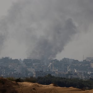 Smoke rises over Gaza, amid the ongoing conflict between Israel and the Palestinian Islamist group Hamas, as seen from southern Israel, December 8, 2023. 