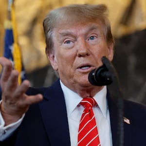 Republican presidential candidate and former U.S. President Donald Trump talks  reporters at the International Brotherhood of Teamsters headquarters on January 31, 2024 in Washington, DC.