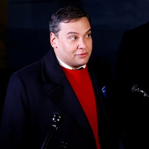 U.S. Rep. George Santos (R-NY) talks to reporters while walking to attend a vote on whether the House of Representatives will expel him. 