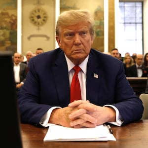 Former US President Donald Trump sits in New York State Supreme Court during the civil fraud trial against the Trump Organization