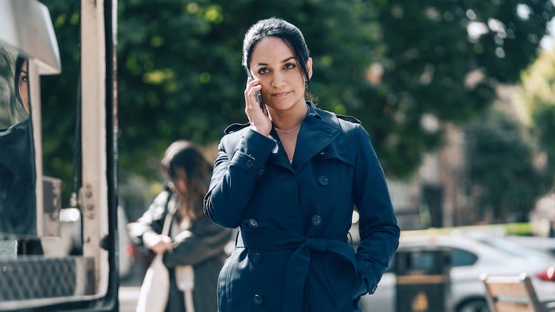 Archie Panjabi talks on a phone in 'Hijack.'