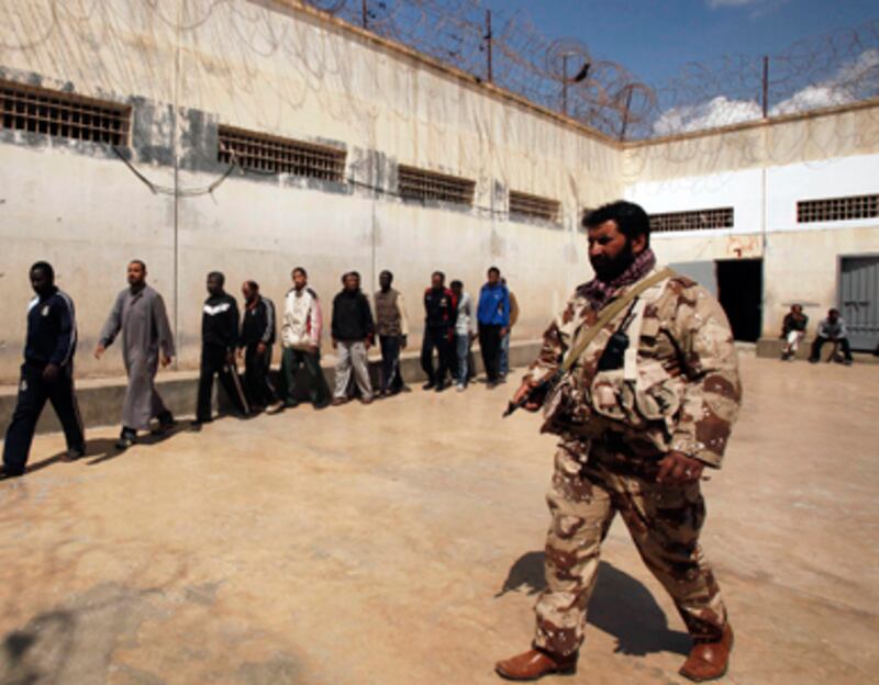 articles/2011/03/24/inside-a-libyan-rebel-prison-camp/babak-libya-prison-camp_168934_uldat3