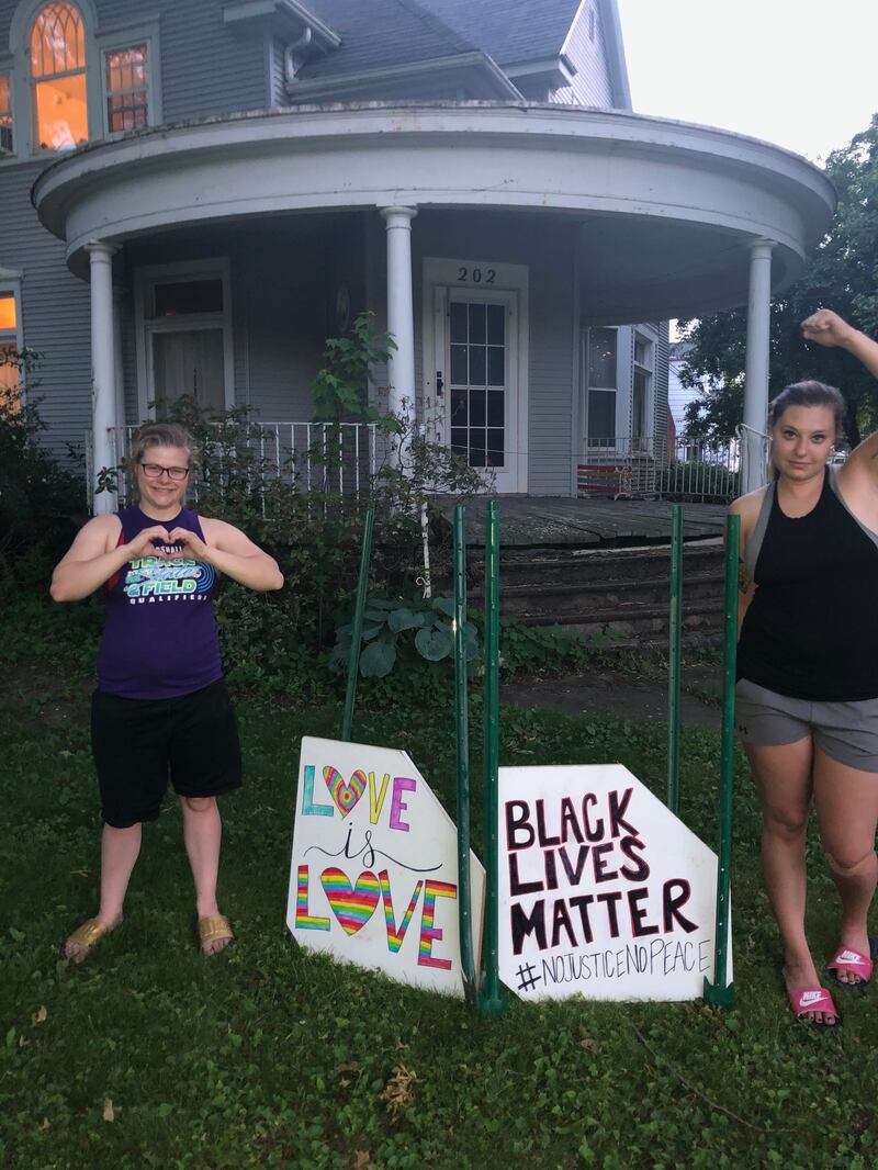 Maggie_Sodders_on_the_left_and_Mady_Feathers_on_the_right_in_front_of_the_Sodders_home_o8wid2