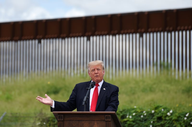 Former U.S. President Donald Trump visits an unfinished section of the wall along the U.S.-Mexico border in Pharr, Texas, June 30, 2021.