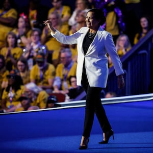 Former Trump White House Press Secretary Stephanie Grisham takes the stage during the second day of the Democratic National Convention in Chicago.