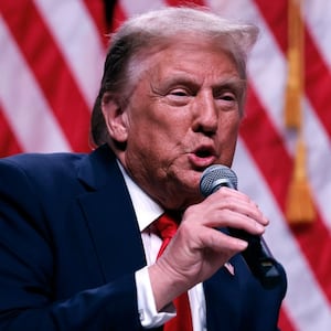 Republican presidential nominee, former President Donald Trump sits down for a conversation with Tucker Carlson during his Live Tour at the Desert Diamond Arena on October 31, 2024 in Phoenix, Arizona. With less than a week until Election Day, Trump is campaigning for re-election in New Mexico and the battleground states of Nevada and Arizona on Thursday.