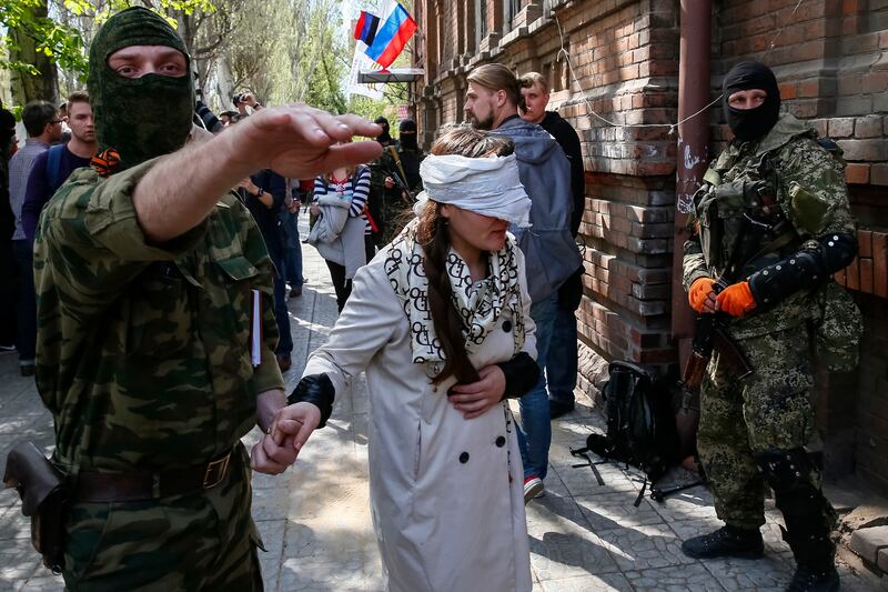 articles/2014/05/18/ukraine-journalists-still-enduring-brutal-kidnappings-imprisonment-and-maybe-worse/140717-ukraine-abductions-tease_bnepfr