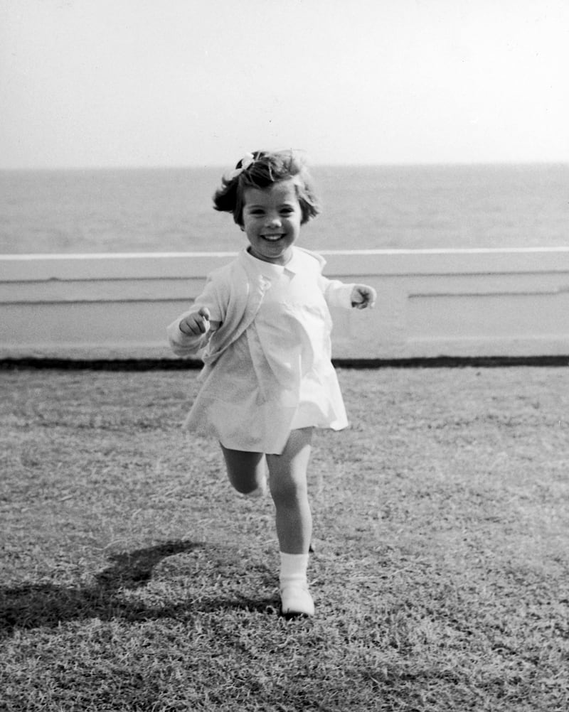 galleries/2013/07/26/caroline-kennedy-through-the-years-photos/caroline-running-grass_e468vh