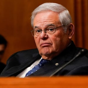 Bob Menendez stares forward during a hearing in Congress.