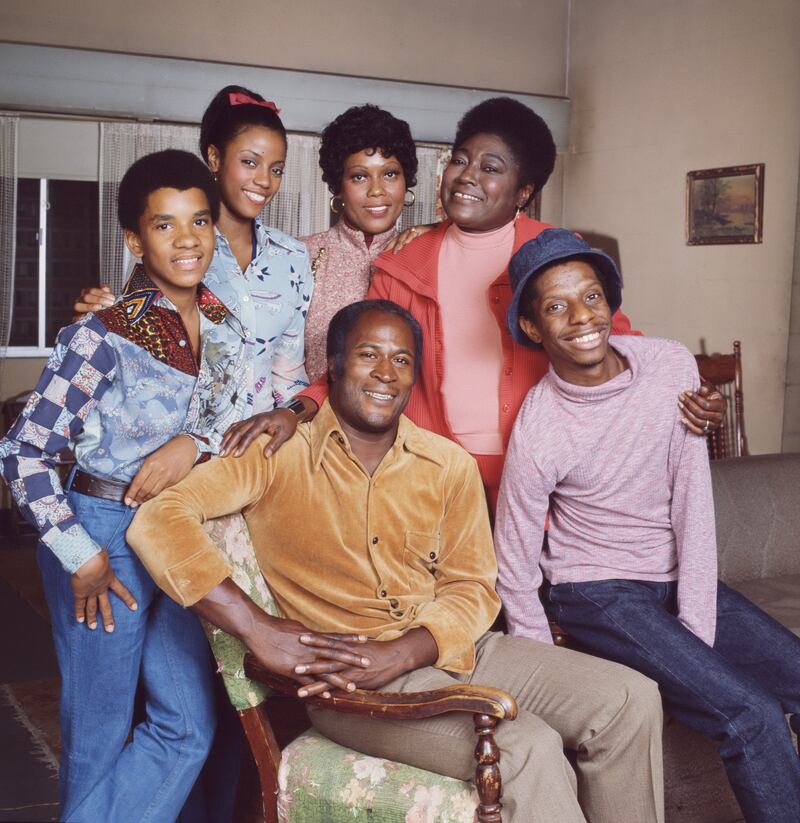 The cast of the television show Good Times, John Amos (left) and Jimmie Walker; back row, from left, Ralph Carter, BernNadette Stanis, Ja'net DuBois, and Esther Rolle