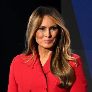 Melania Trump has appointed a Wall Street executive to guide her transition.