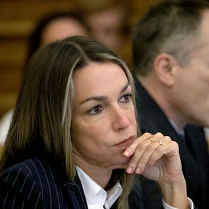 Karen Read listens to testimony during her murder trial. 