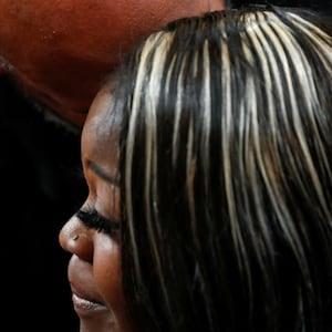 Shaye Moss looks down as she attends a Congressional hearing about the Jan. 6 attack.