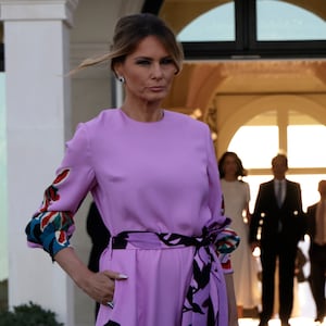 Donald Trump and former first lady Melania Trump arrive at the home of billionaire investor John Paulson in Palm Beach, Florida.