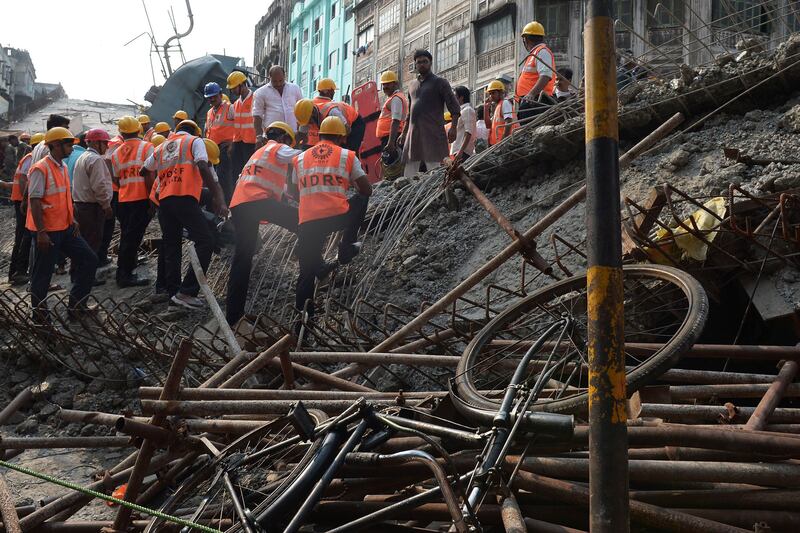 galleries/2016/03/31/indian-bridge-collapse-kills-14-people/160331-Kolkata-Overpass-Collapse-06_q5d6pt