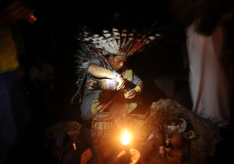 Ayahuasca is preupared to use in a healing ritual in the village of Novo Segredo along the Envira river of Brazil's northwestern Acre state.