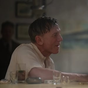 A photo still of Daniel Craig and Drew Starkey in Queer