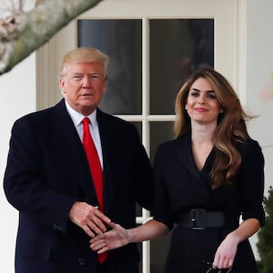 Donald Trump shakes hands with former White House Communications Director Hope Hicks outside of the Oval Office. 