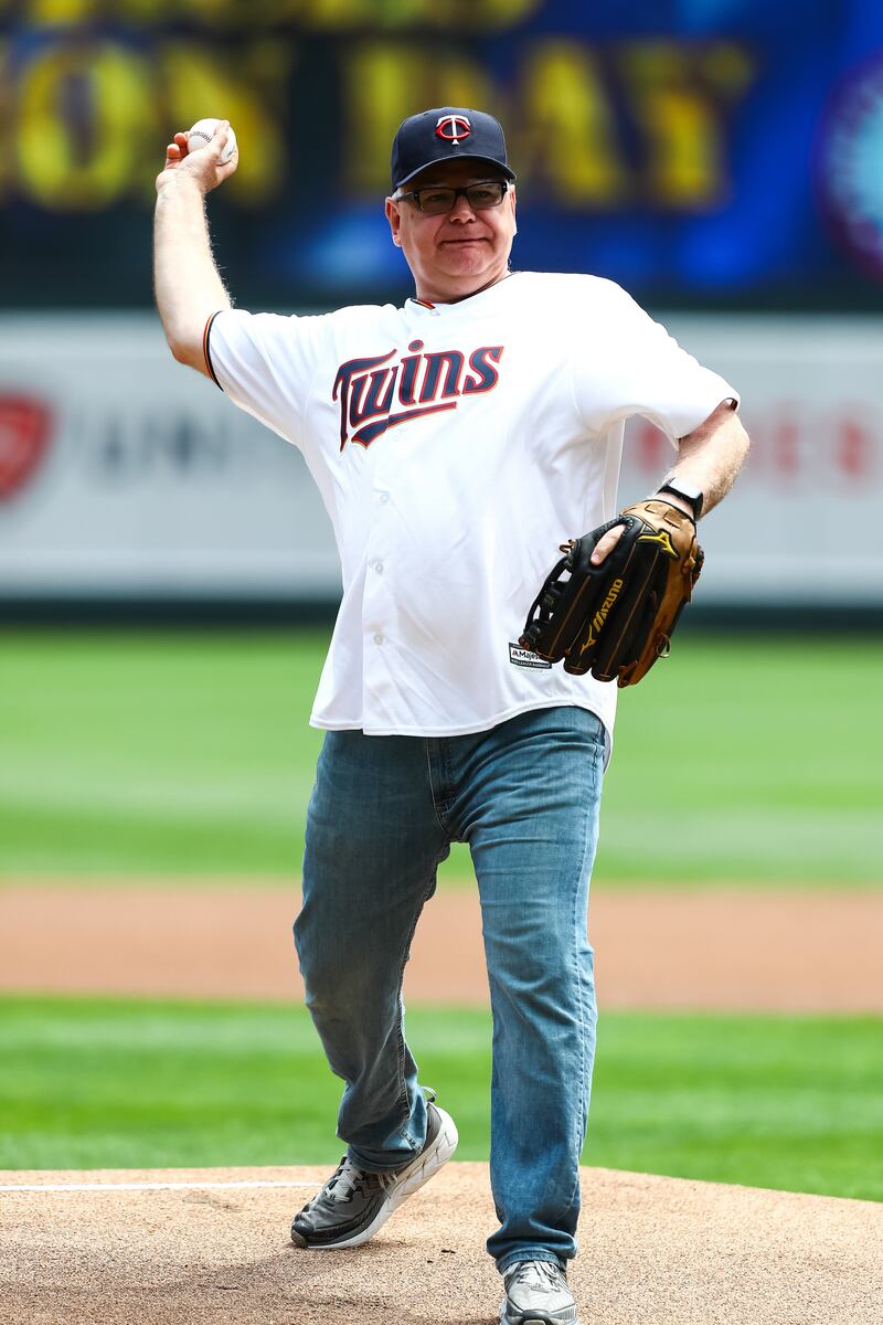 Minnesota Gov. Tim Walz throws out the ceremonial first pitch before a game between the Texas Rangers and the Minnesota Twins at Target Field, July 7, 2019.