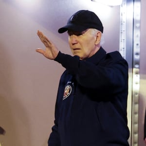 Joe Biden waving form the steps of Air Force One