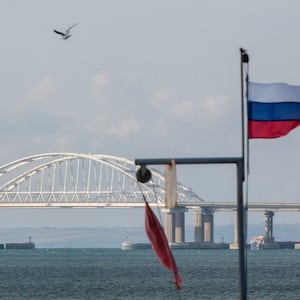 A view taken on October 14, 2022 shows the Kerch Bridge that links Crimea to Russia, near Kerch, which was hit by a blast on October 8, 2022.