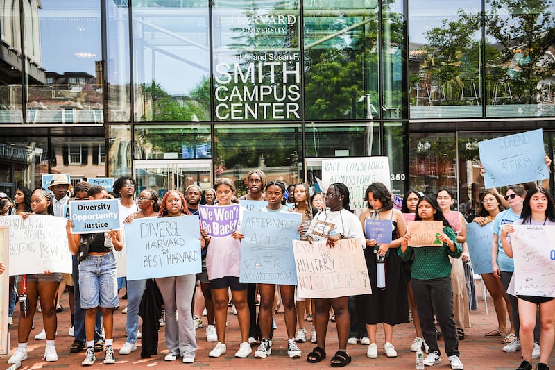 Participants rally protesting the Supreme Court's ruling against affirmative action.