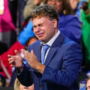 Gus Walz cries as Democratic vice presidential nominee Minnesota Gov. Tim Walz speaks during the Democratic National Convention Wednesday, Aug. 21, 2024, in Chicago.